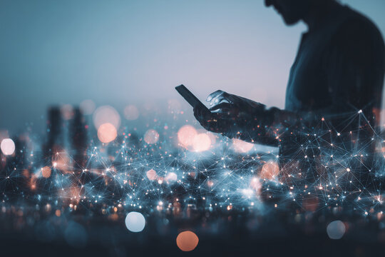 Big data, digital technology, internet network connection, futristic technology background. Man using mibile phobe and laptop and smart city