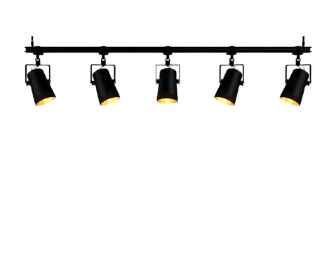 Five black metal track lights illuminate a stage or studio, providing focused lighting and spotlighting for events and performances. (144)