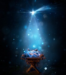 Nativity - Waiting Birth Of Jesus Christ With Empty Manger In Snowy Night With Comet Star And Abstract Defocused Bokeh

