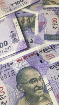 New Indian 100 Rupee Banknotes Isolated on White Background