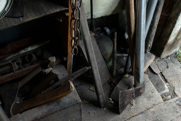 Tools and Scrap Metal Clutter in a Workshop or Shed Corner