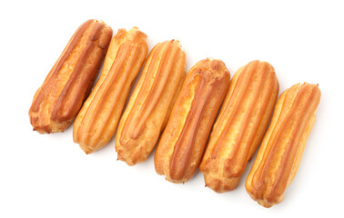 Tasty eclairs isolated on white, top view