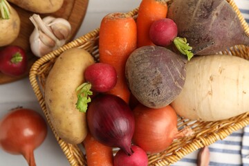 Different raw vegetables on table, flat lay