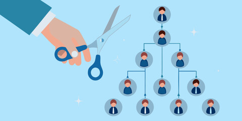 Hand with scissors cutting organizational chart