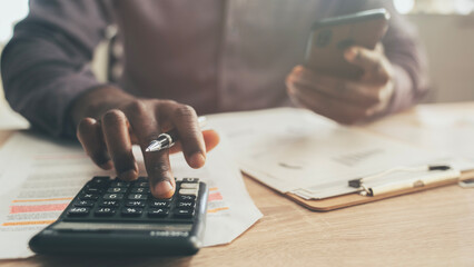 Businessman planning budget in office