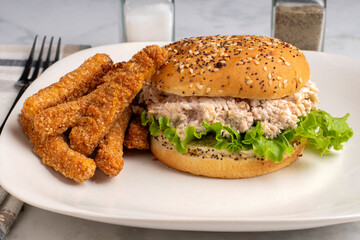 chicken salad  sandwich  served with chicken fries