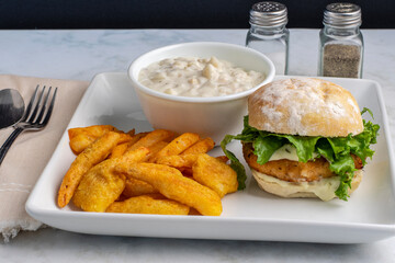 salmon burger with  french fries  and breaded shrimp