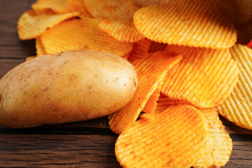 Potato chips in open bag, delicious BBQ seasoning spicy for crips, thin slice deep fried snack fast food.