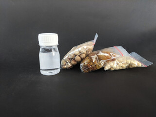 Zam water, Packaged nuts, macadamia in packaging with black background