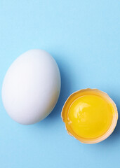 fresh farm chicken eggs on a colored background. Vertical photo format