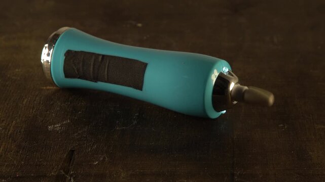 Portable stone attachment rotates on a grinder video with sound