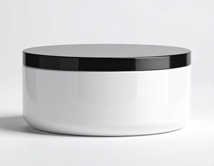 Glossy black lid on a white, round container