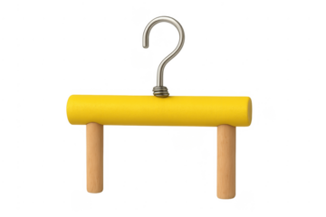 Yellow wooden clothes hanger forming question mark