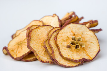 Dried apple slices on a white background. Healthy food concept.