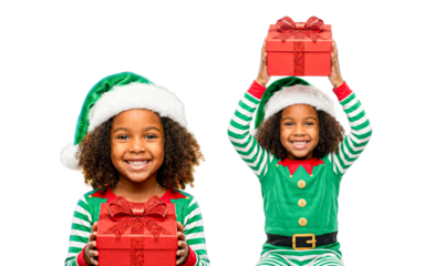 Two Happy African American Girls Dressed as Christmas Elves, Holding and Presenting Red Gift Boxes, Isolated on White Background
