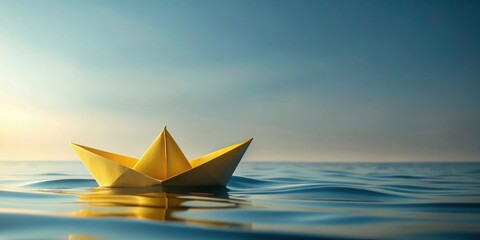 Obraz premium A solitary yellow paper boat floats gently on the tranquil water, bathed in the soft glow of sunrise, symbolizing hope, dreams, and the journey ahead.