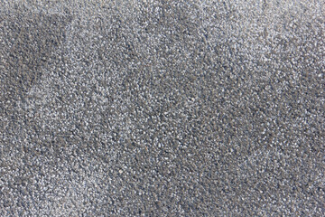 Asphalt background. Dark grey bitumen texture.
