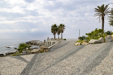 The Cap Ampelio at the end of the Lungomare Argentina seafront in Bordighera on the italian riviera
