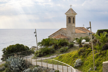 Sant' Ampelio church on the Cap st Ampelio at the end of the Lungomare Argentina seafront in Bordighera, Italy