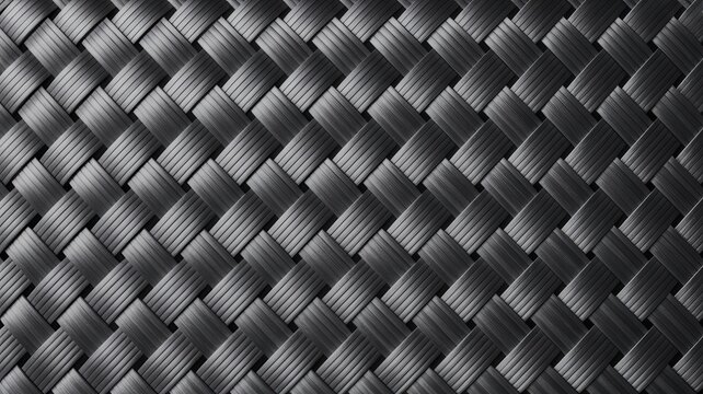 Close up of a dark gray woven fabric texture with a repeating diamond pattern