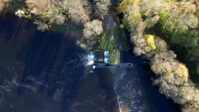 Totnes, Devon, England: DRONE VIEWS: An overhead view of the Weir Hydro: a twin archimedes screw design producing water-powered, clean electricity; it generates 1,250 MWh of electricity per year.