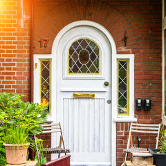 typical century Dutch door holland view in a fortified town with brick houses and front flower...