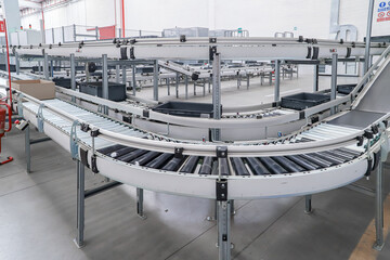 packing line in a logistics warehouse. conveyor belt in a modern production line
