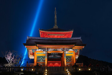 Fototapeta premium Beautiful illuminated Kiyomizu-dera temple meaning Pure water temple, at waterfalls in wooden hills of east of Kyoto, Japan