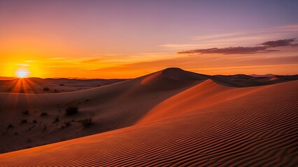 Vibrant desert sunset with sand dunes, warm light, and a clear sky