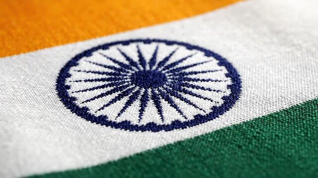 Close up of embroidered Indian flag fabric showing Ashoka Chakra