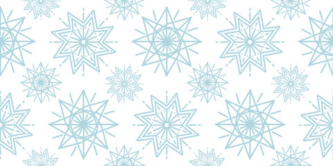 Soft pastel blue star shaped snowflakes arranged in seamless winter pattern on white background, ideal for textiles, wrapping paper, and festive prints