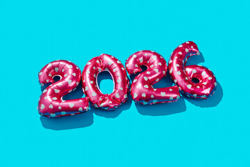 pink balloons form number 2026 as the new year