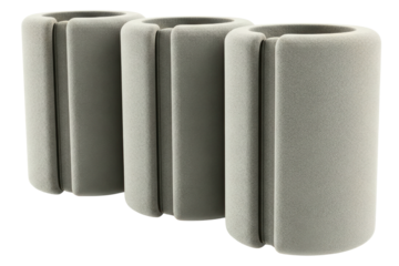 Three grey foam protective tubes for pipe insulation on a transparent background