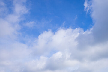 Clouds and sky on a clear day during the day,Blue sky background and white clouds soft focus, and copy space