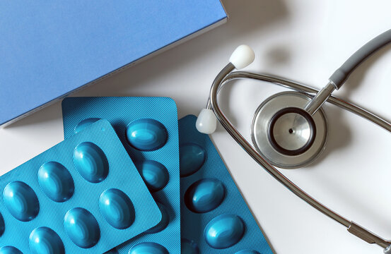 Medical concept. Blue drugs blister packaging.