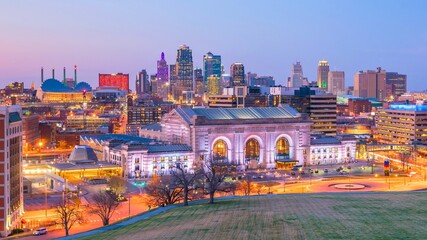 Vibrant cityscape at dusk with illuminated buildings and skyline