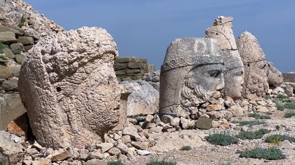 Turkey, Adiyaman, May 3, 2024: ruins at the top of Mount Nemrut. Destroyed ancient statues in the Taurus Mountains. Ancient stone heads on top of Mount Nemrut. 4К