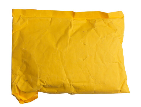 Crumpled Yellow Packaging Envelope on White Background for Shipping, Mail, and Packaging isolated on a white background