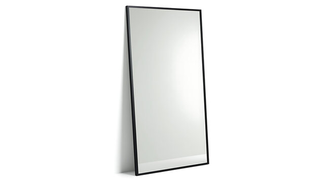 Full length mirror with black frame leaning against a white wall