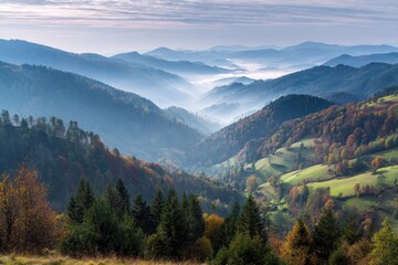 Misty mountain valley at dawn, autumn colors