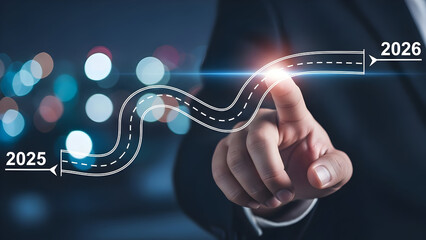 Businessman tracing a path to future success and goals with technology