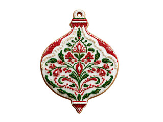 Decorated Christmas ornament cookie with red and green icing, festive holiday gingerbread bauble dessert, isolated on white background