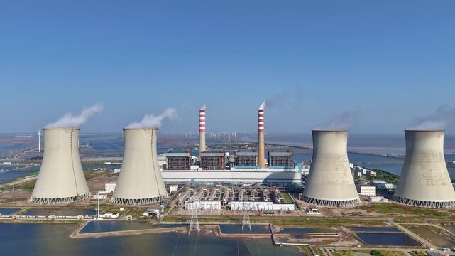 A time-lapse aerial view of the power plant located by the coast of Tianjin