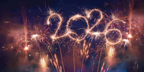 Gordijnen Gekleurd Glas happy new year, new year's eve, silvester, new year, celebration greeting card, new year card - Year 2026 in sparkler font and firework fireworks pyrotechnic, isolated on black night sky background  © Corri Seizinger