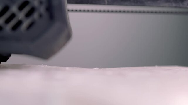 Operational 3D Printer Hotend Actively Extruding Filament During Real-Time Layer Construction Filmed at 60 FPS