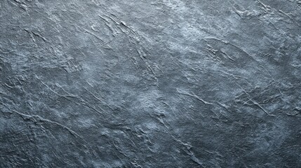 Obraz premium Textured dark slate background with subtle highlights
