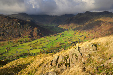 Naklejka premium Rural English countryside with spectacular views of Great Langdale Valley in The Lake District, UK.