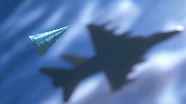 Mysterious paper airplane flying in blue sky, creating an eerie contrast with blurry silhouette of military jet shadow
