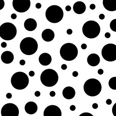 Seamless black and white polka dot pattern with random scattered monochrome dots. Simple abstract background suitable for textile, fabric, posters, cards, and wrapping designs