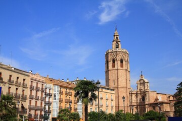 Valencia city, Spain. Street view with Valencia Cathedral. Sunny weather day.